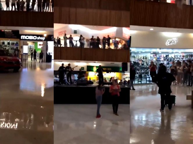 Mientras la plaza se inundaba, músicos tocan canción de “Titanic” (Video)