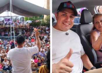 El alcalde de Jiutepec, Eder Rodríguez Casillas, entrega las llaves de un automóvil nuevo a la ganadora de la rifa en el Zócalo municipal