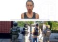Elementos de la Agencia de Investigación Criminal de Morelos y de la Marina resguardando el exterior de una vivienda pintada durante un cateo en Tlaltizapán....
