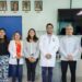 El fiscal general de Morelos conversando con el director del Hospital de la Niñez Morelense y personal ministerial dentro de las oficinas del Ministerio Público en Emiliano Zapata.
