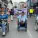 protesta silla de ruedas alza pasaje